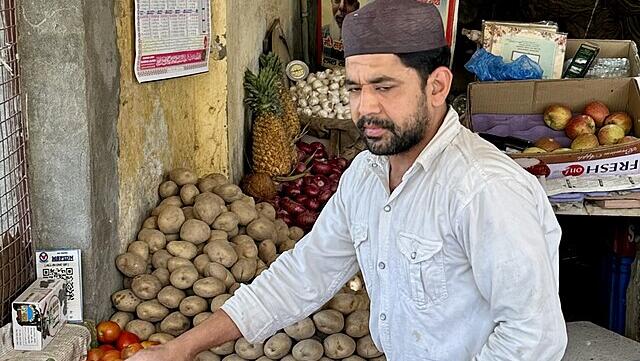 India's inflation rate dips under target; food plunges