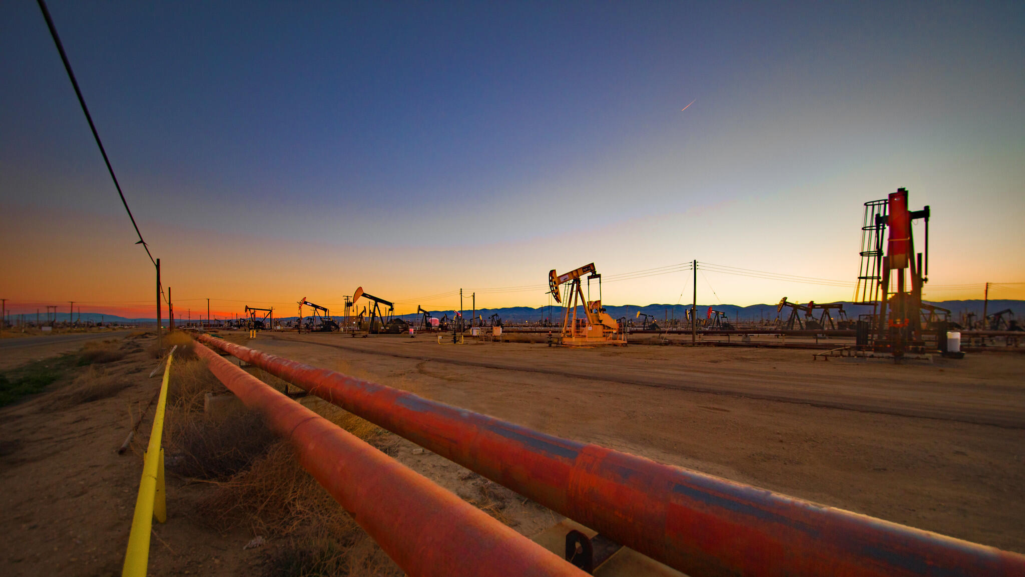 Oil ticks up on supply concerns; auto tariffs weighed