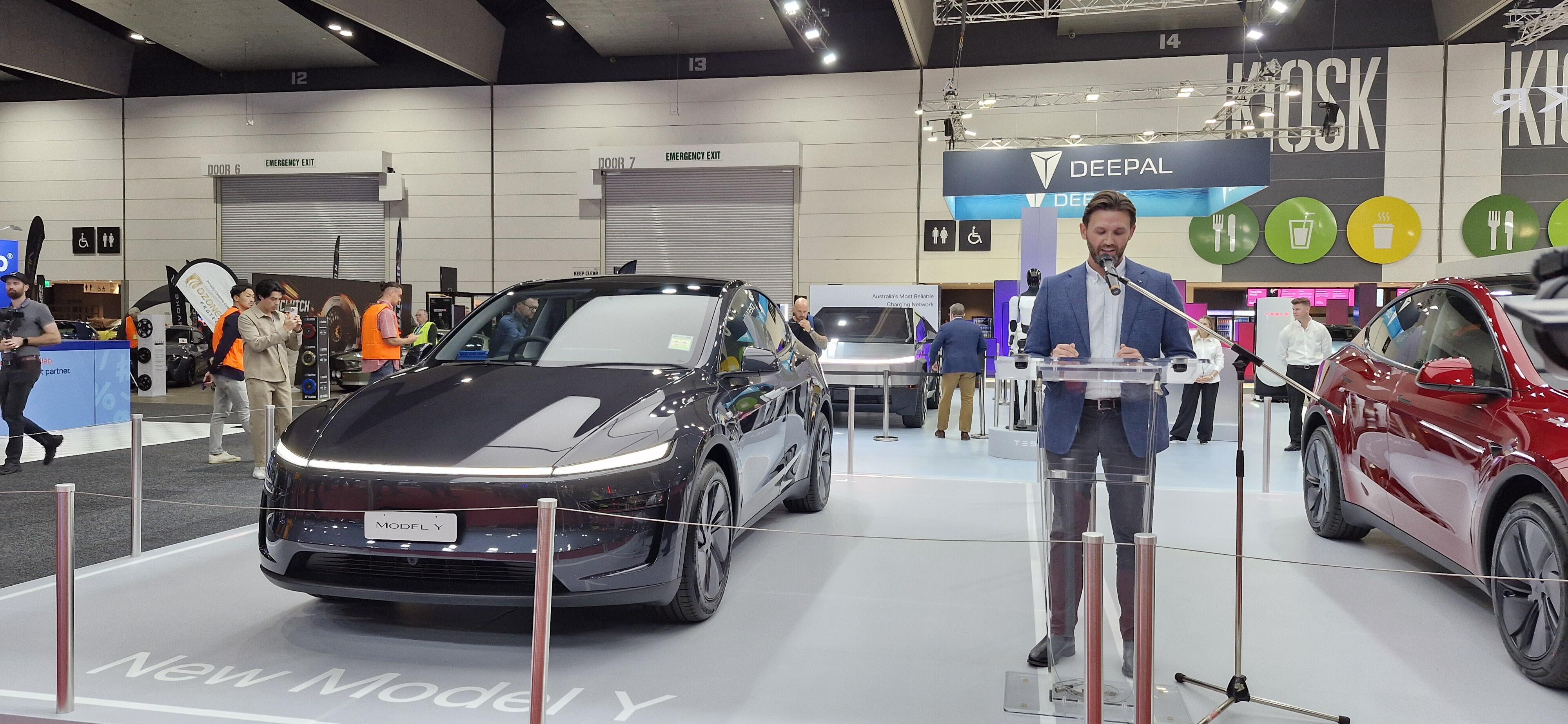Thom Drew presenting the Tesla Model Y