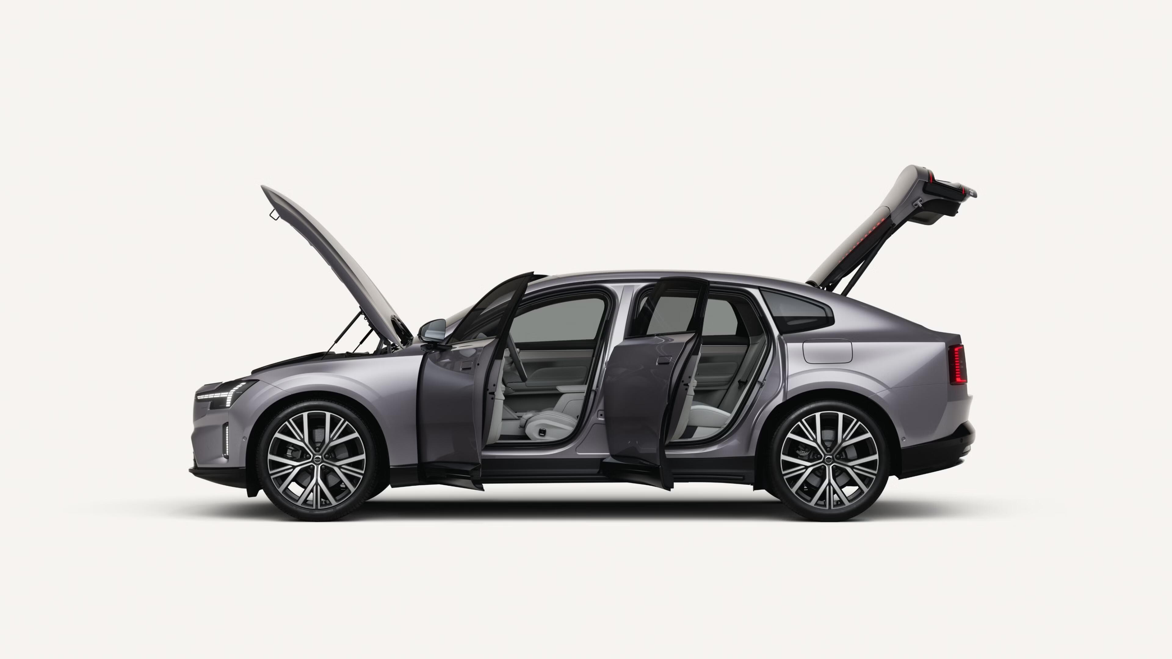 A silver sedan with the doors, hood, and trunk open