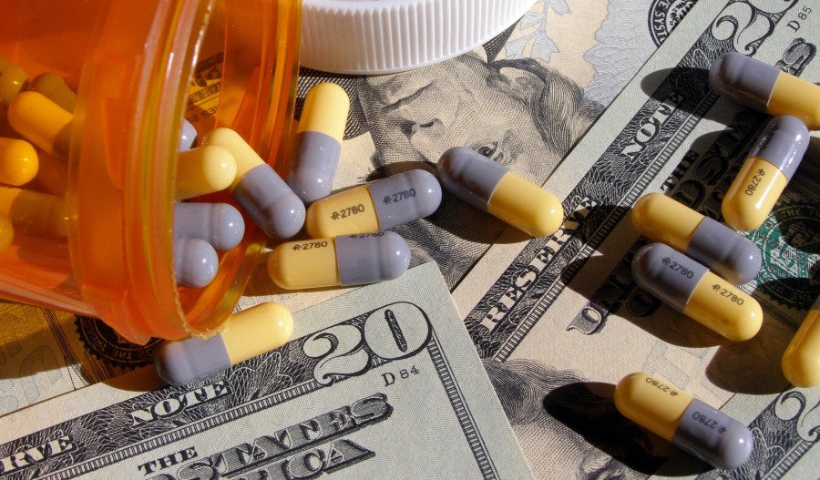 Eli Lilly falls on profit downgrade; drug sales surge