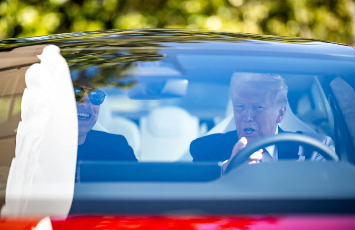 Trump and Musk in a Tesla