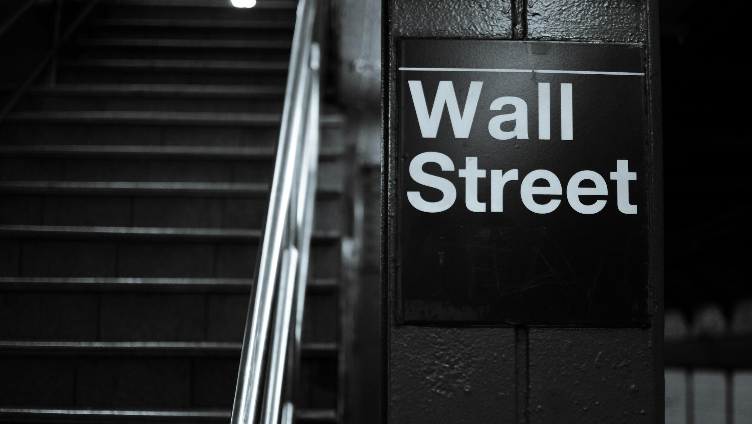 US markets finish mixed on fresh Trump tariff threats