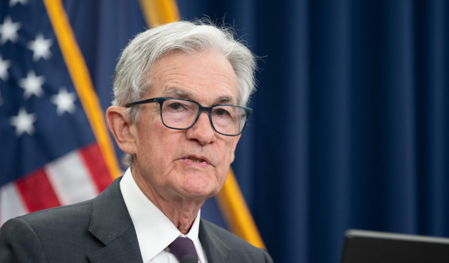 Fed holds rates steady despite dissent, Trump criticism