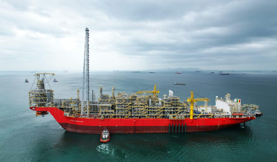 Woodside highlights dividends as profits dive