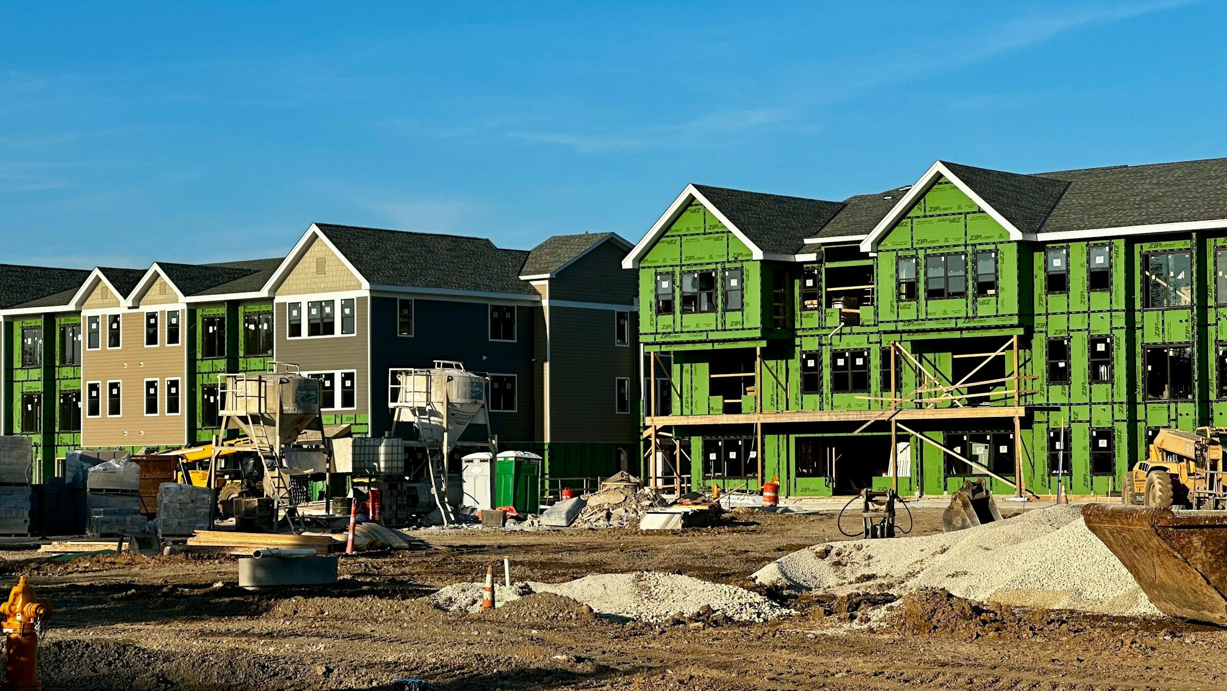US housing starts jump in July, building permits slide