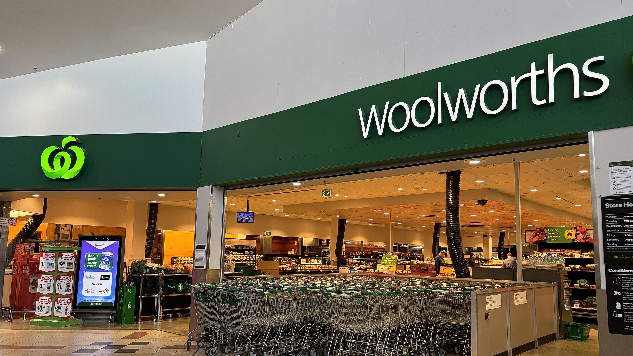 Woolworths promises improvement as profit dives