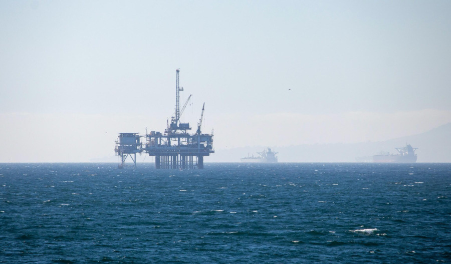 Oil prices slide as OPEC+ weighs new output hike