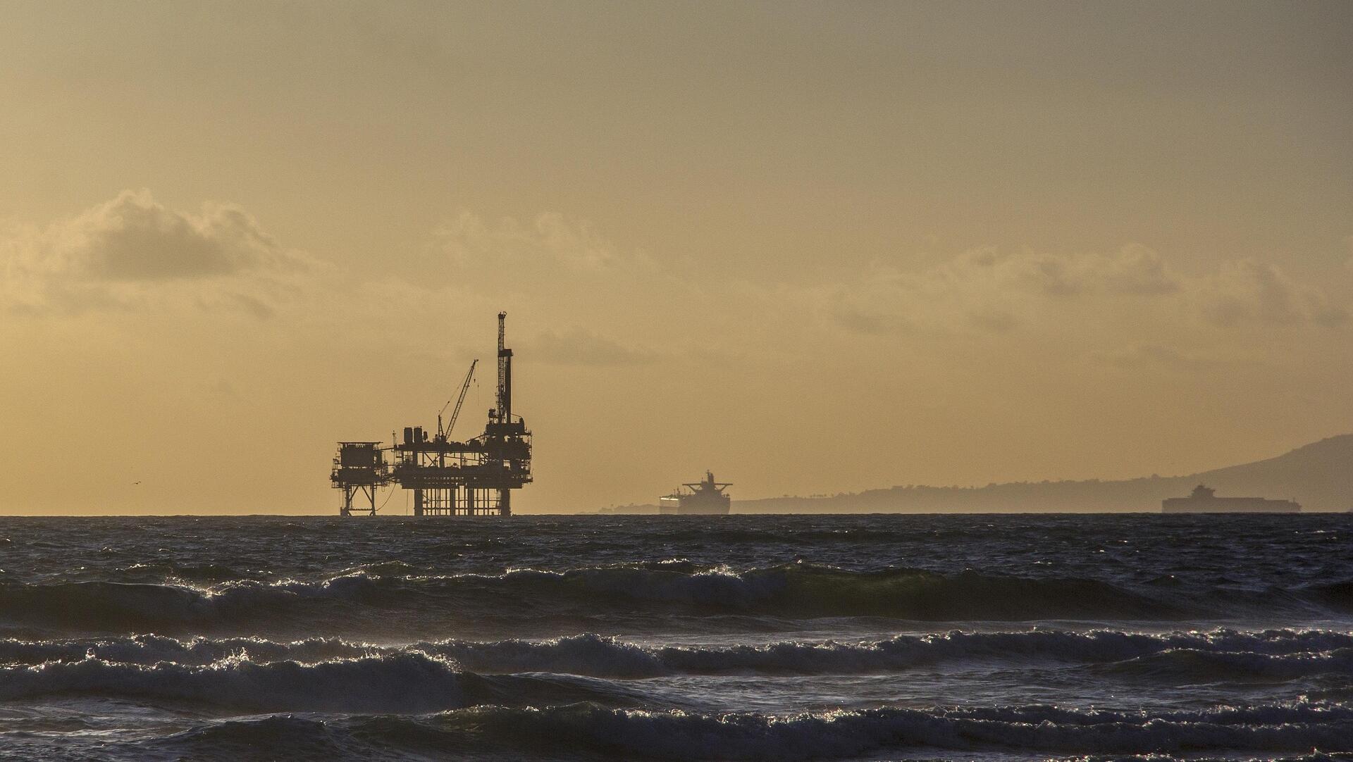 Oil slips on demand worries despite Fed rate cut boost