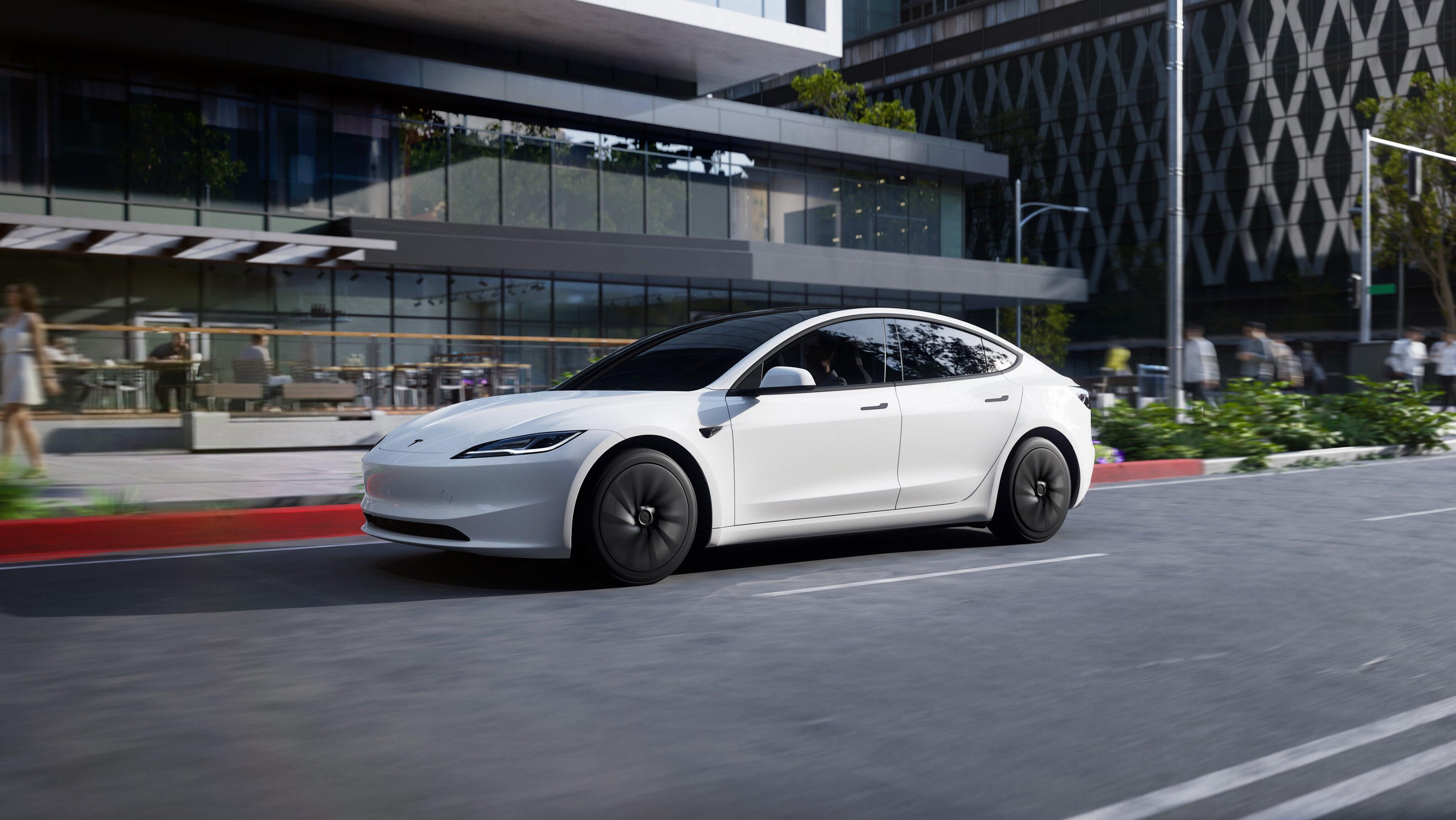 Tesla launches lower-cost models, but shares sink 4.5%