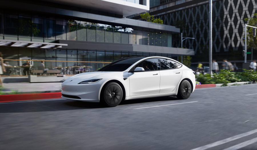Tesla launches lower-cost models, but shares sink 4.5%