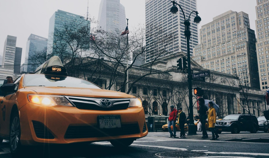 Wall Street ends mixed as Powell tempers rate-cut hopes