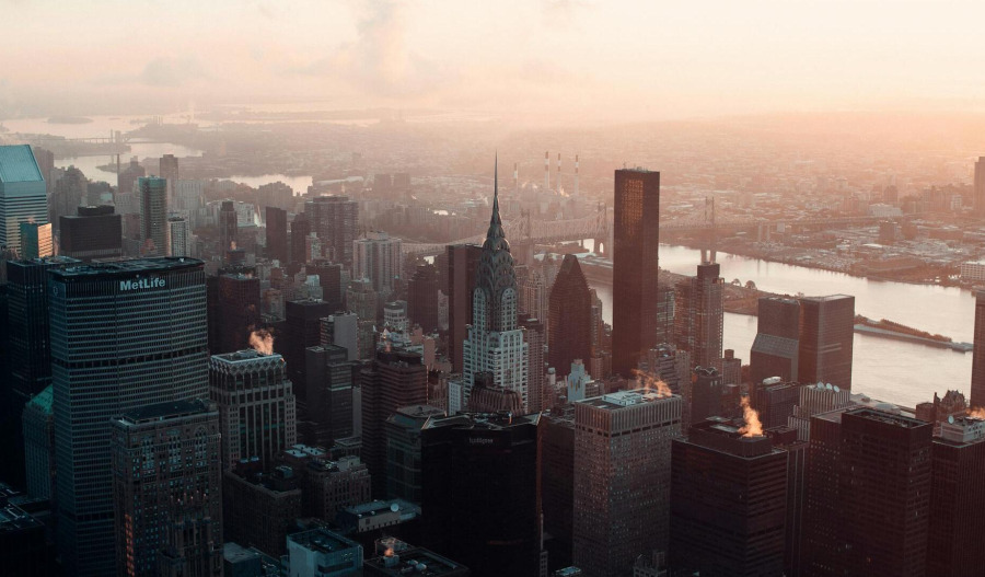 US benchmarks finish higher; Amazon provides boost