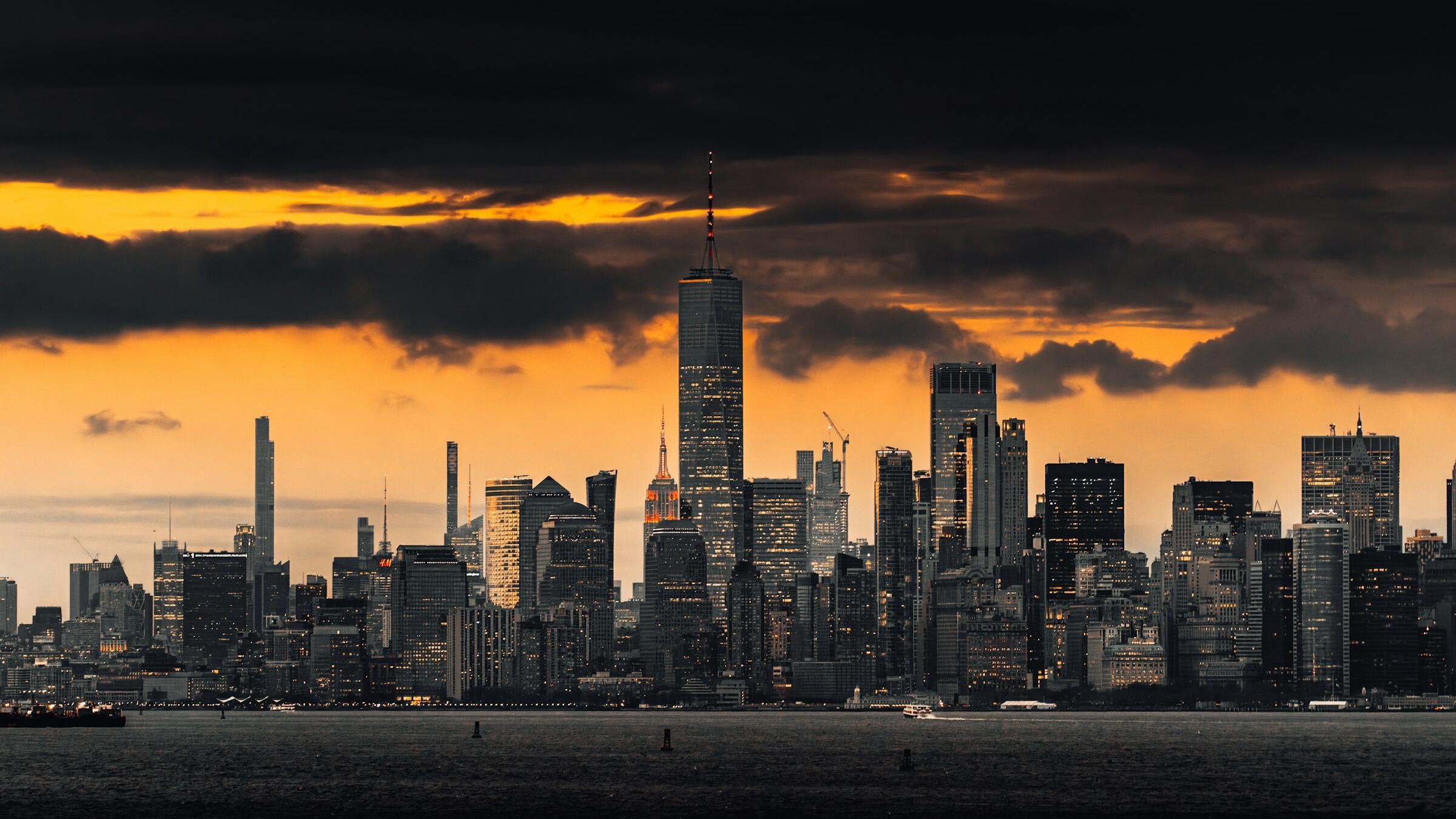 US benchmarks finish lower; AI stocks resume declines