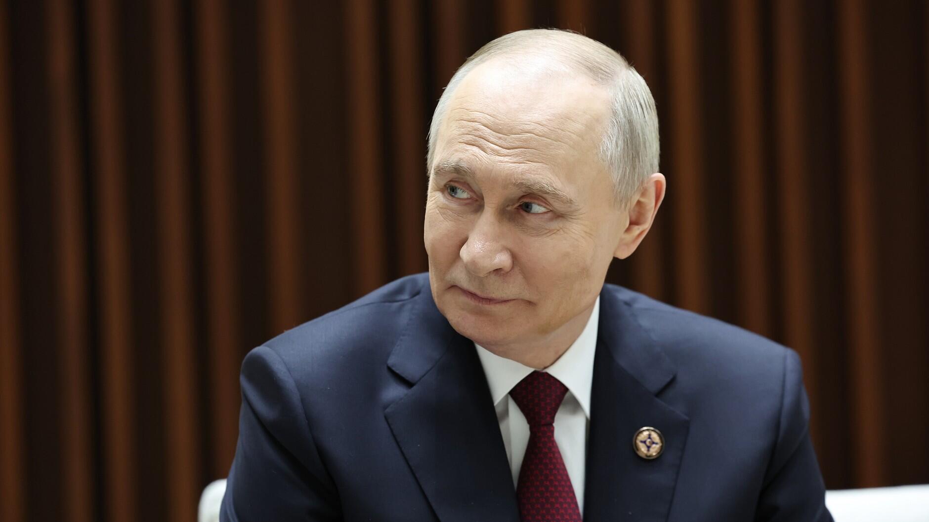 Putin open to US plan but warns of land grabs