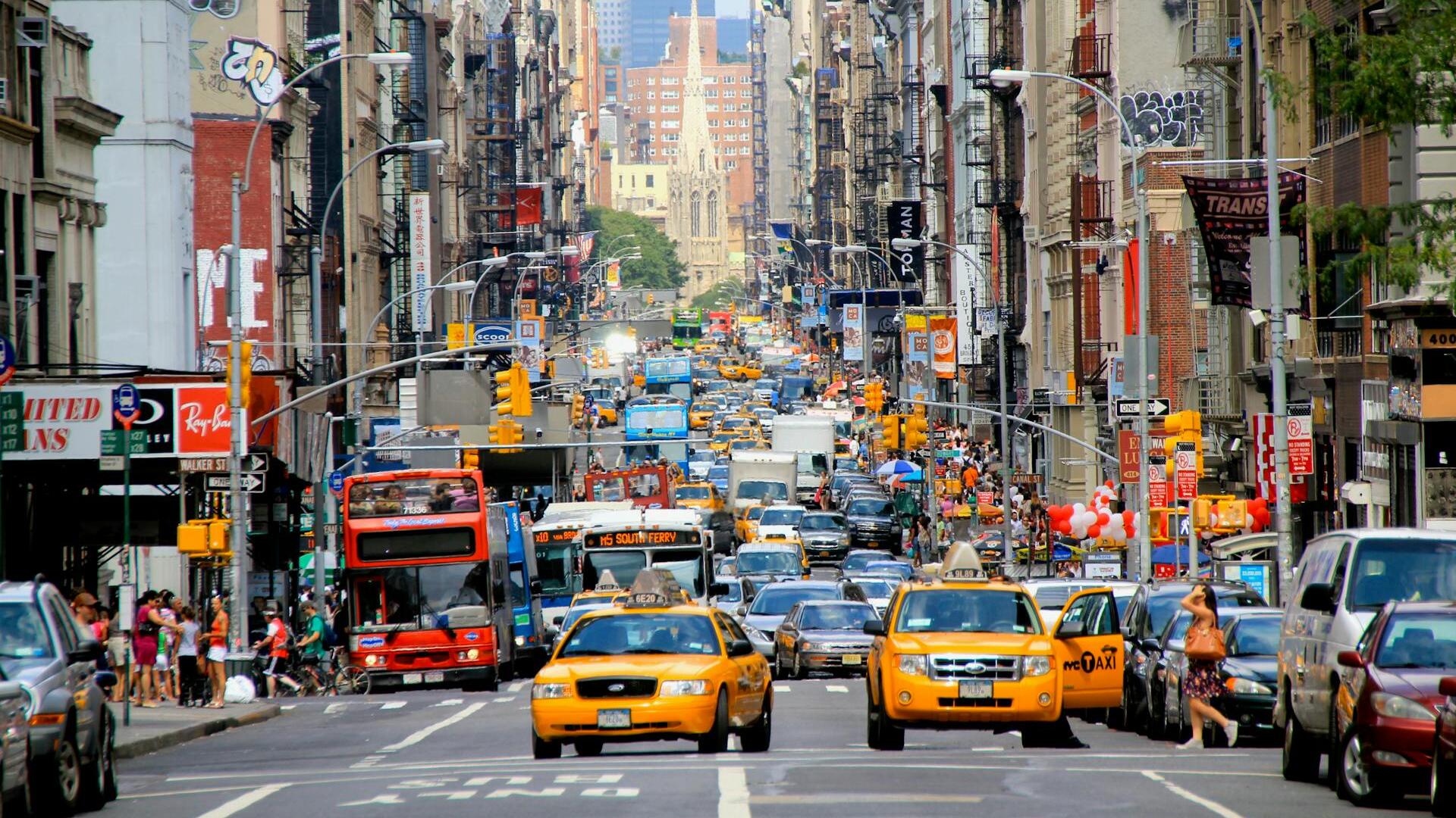 US markets mixed; traders await expected Fed cut