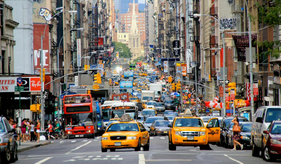 US markets mixed; traders await expected Fed cut