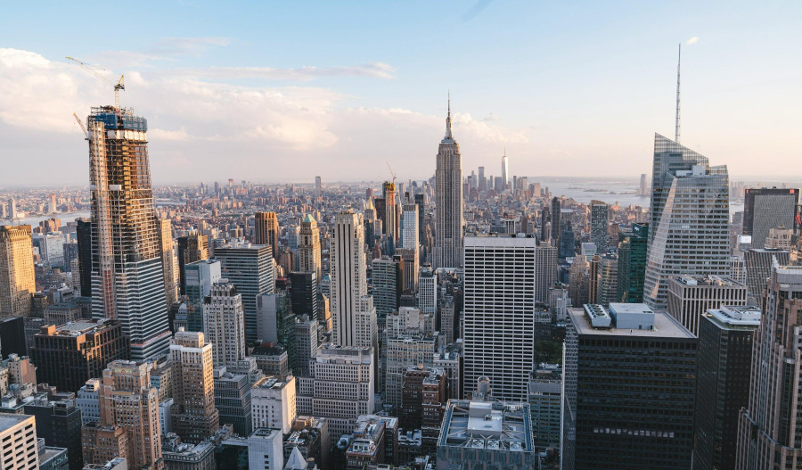 Wall Street closes mixed as tech stocks drop