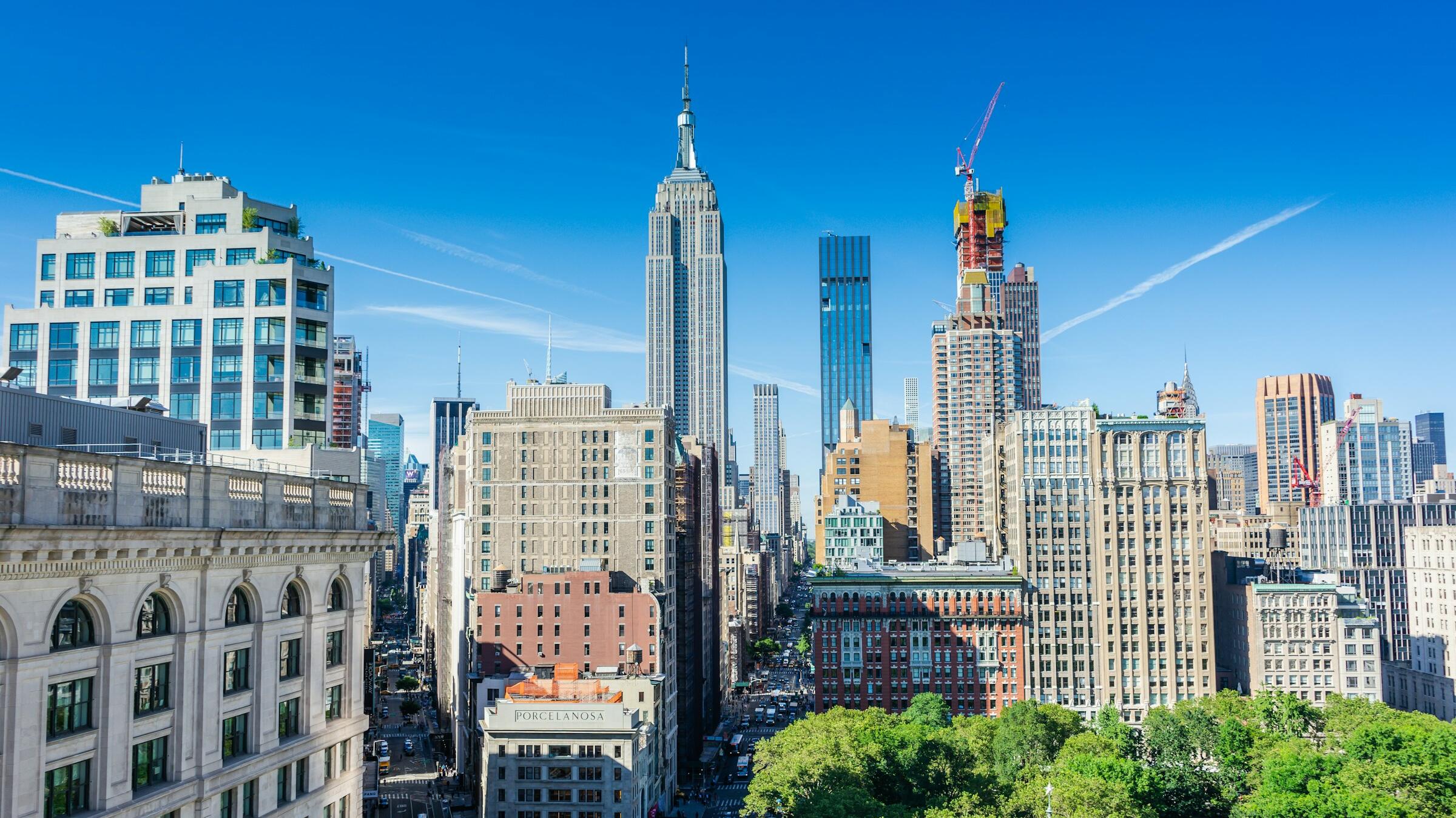 US stocks close at new highs despite middling jobs data