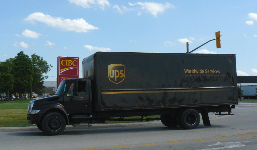 UPS tops Q4 forecasts, plans 30,000 job cuts