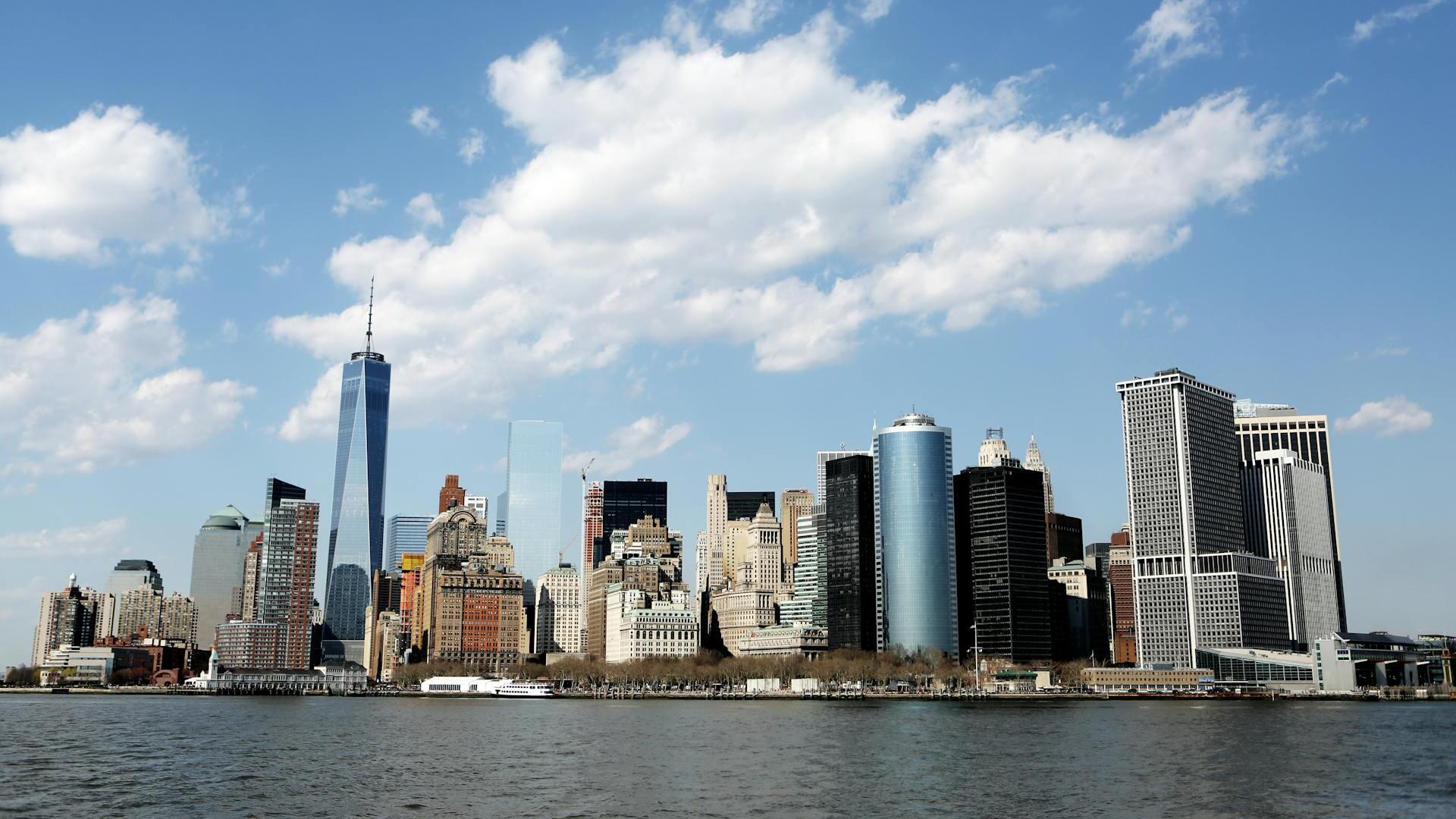 US markets finish mixed as Fed holds rates