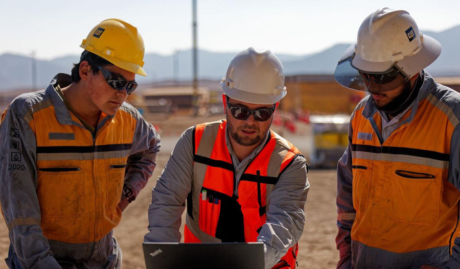 Caterpillar rides AI demand, flags tariff hit