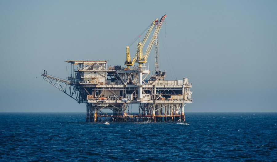 Oil little changed as US-Iran talks extended