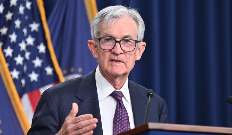 Fed holds rates, flags Iran war uncertainty