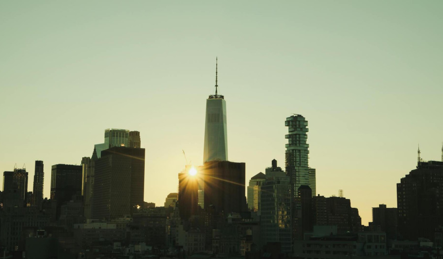 US benchmarks close higher amid Iran talk hopes