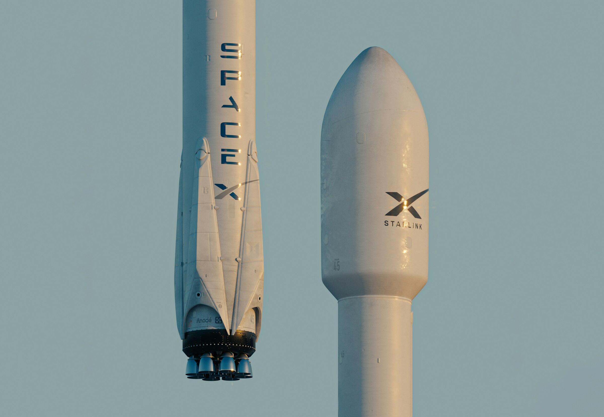 Two white rockets labeled SpaceX and Starlink