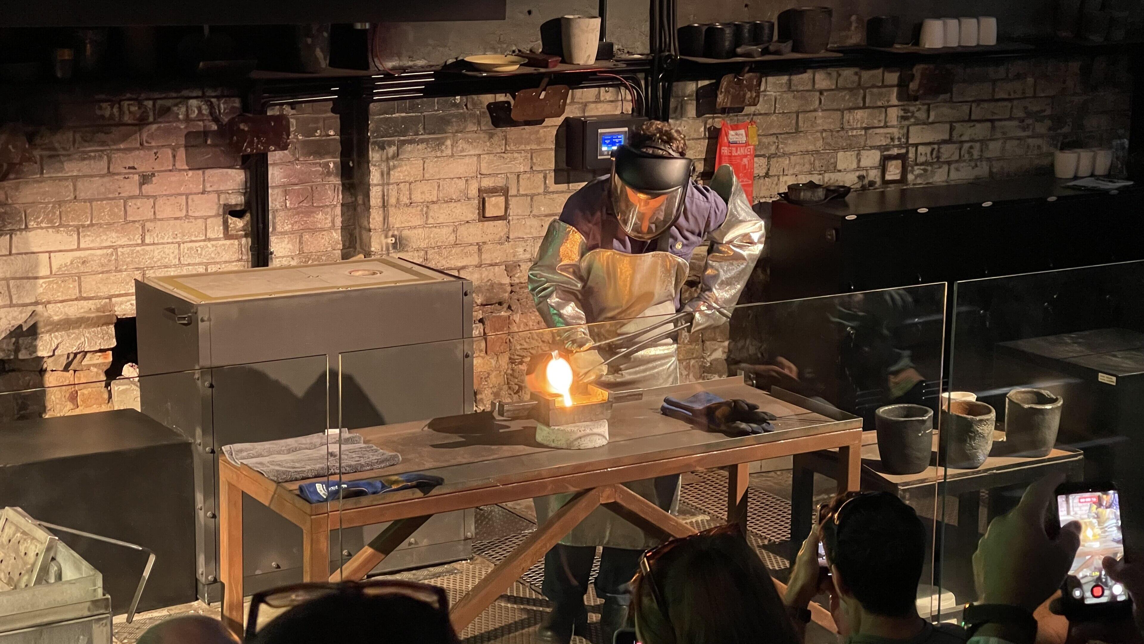 Pouring a gold bar during a tour at the Perth Mint 