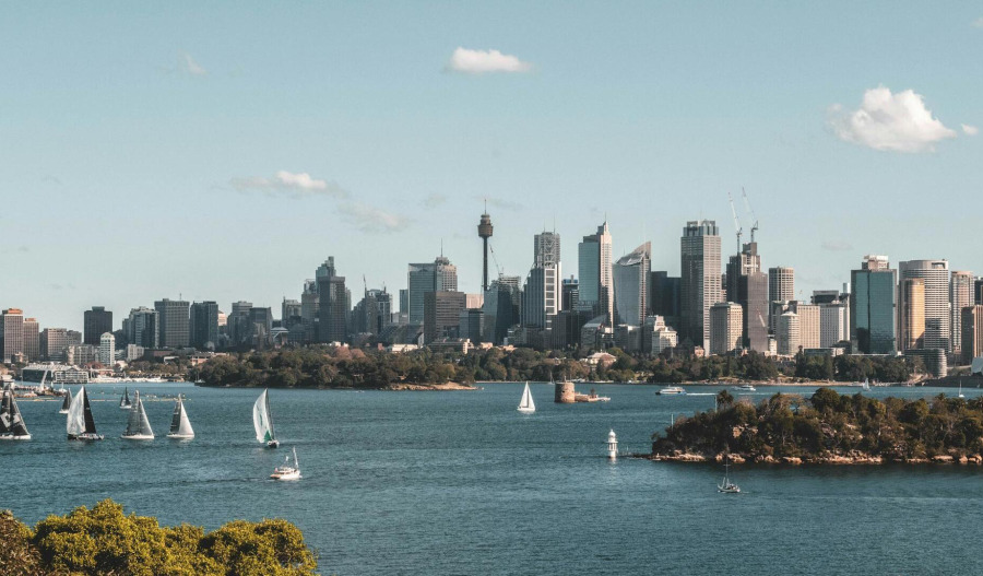 ASX edges higher in mixed trade; GrainCorp slumps 13.5%