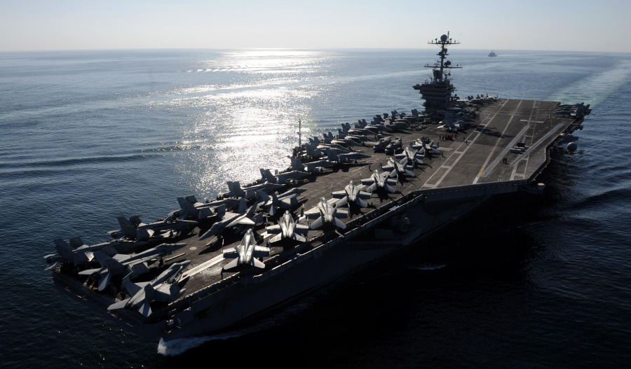 US strikes on Iran continue as Strait tensions escalate