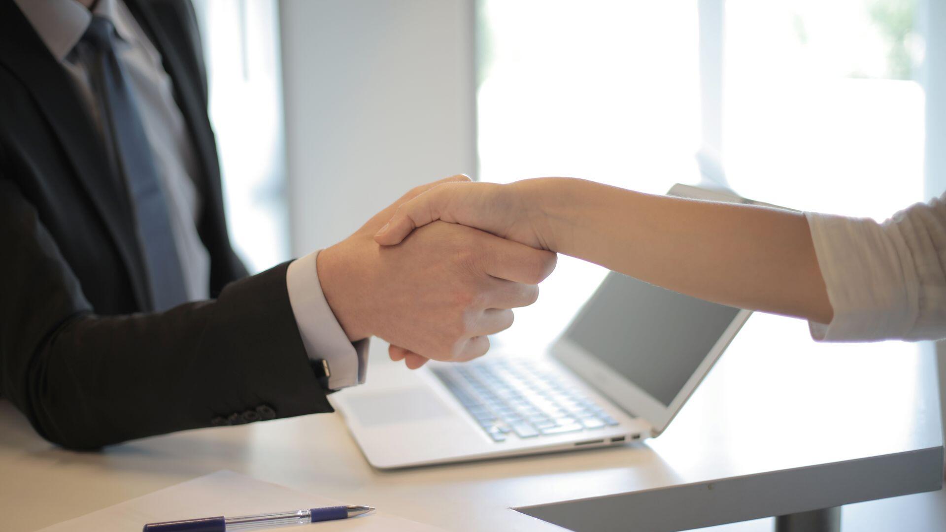 US job openings fall in June as hiring picks up