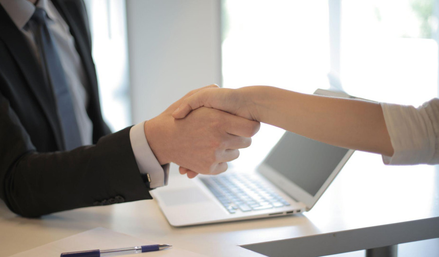 US job openings fall in June as hiring picks up