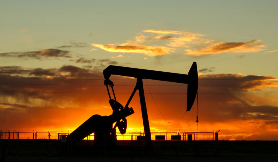 Oil eases but remains on track for second weekly gain