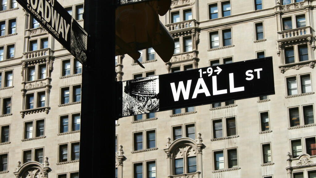 Wall Street: Tech surge drives Nasdaq to record close