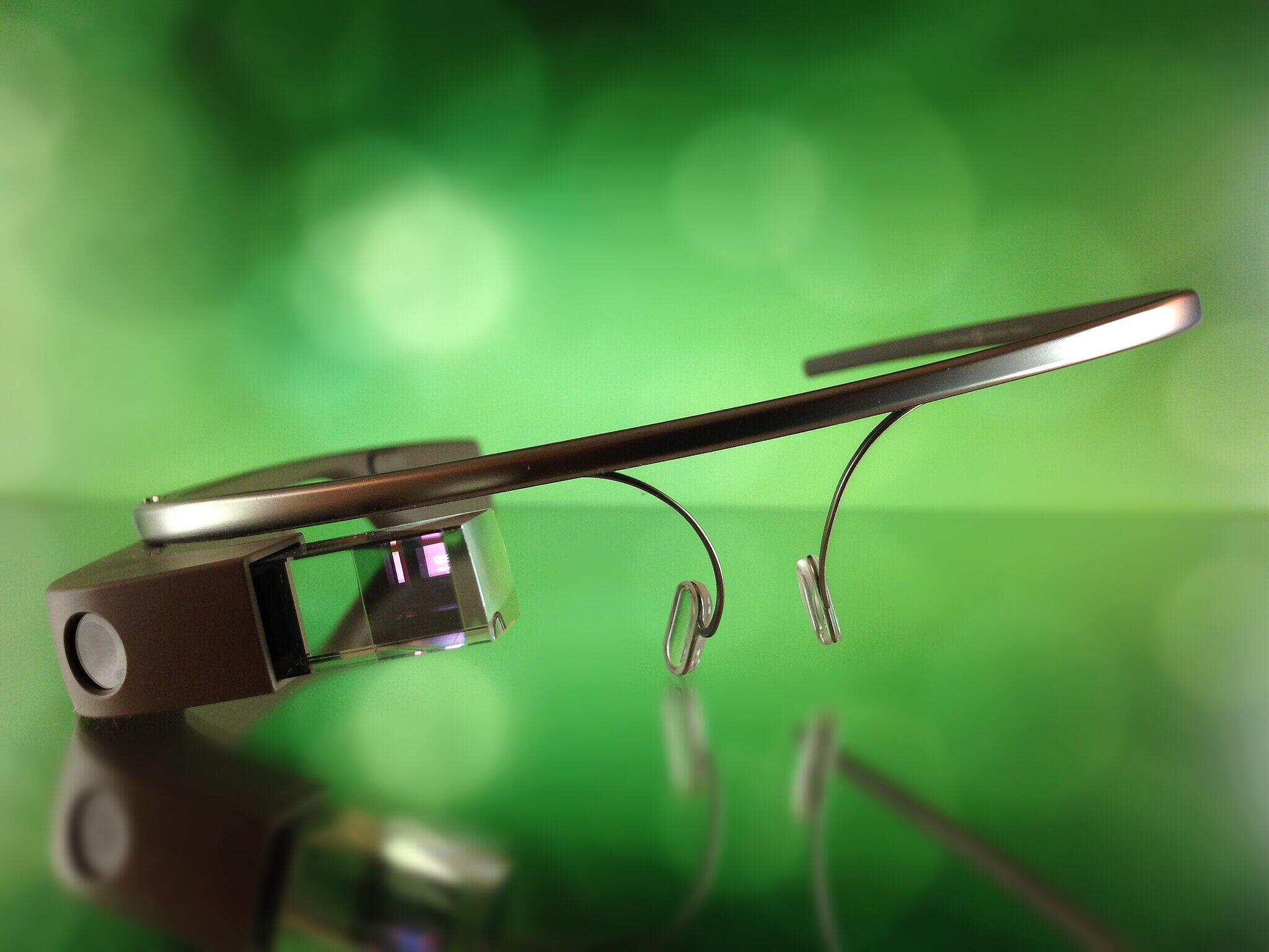 Glasses with wraparound frames and no lenses. Small screen over the right eye.