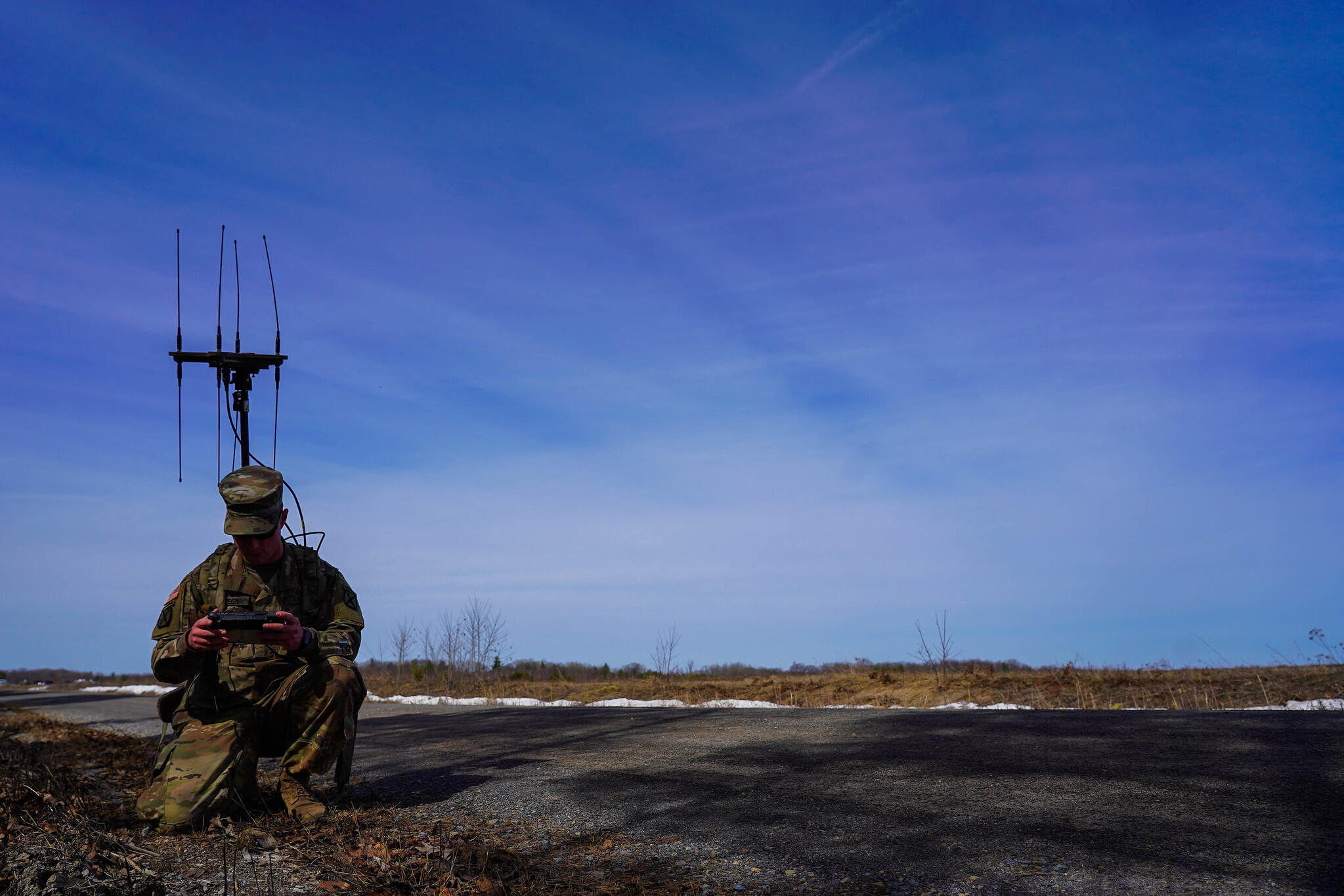 10th Mountain Division Soldiers use the DroneBuster handheld system and electronic warfare backpack in a layered approach to jam and disable training drones on Fort Drum April 2, 2021.