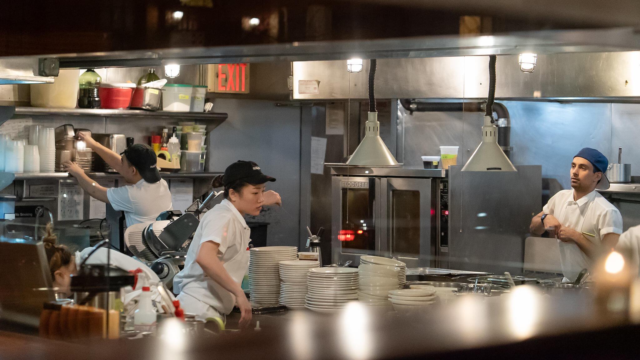 US payrolls surge in Dec; unemployment drops