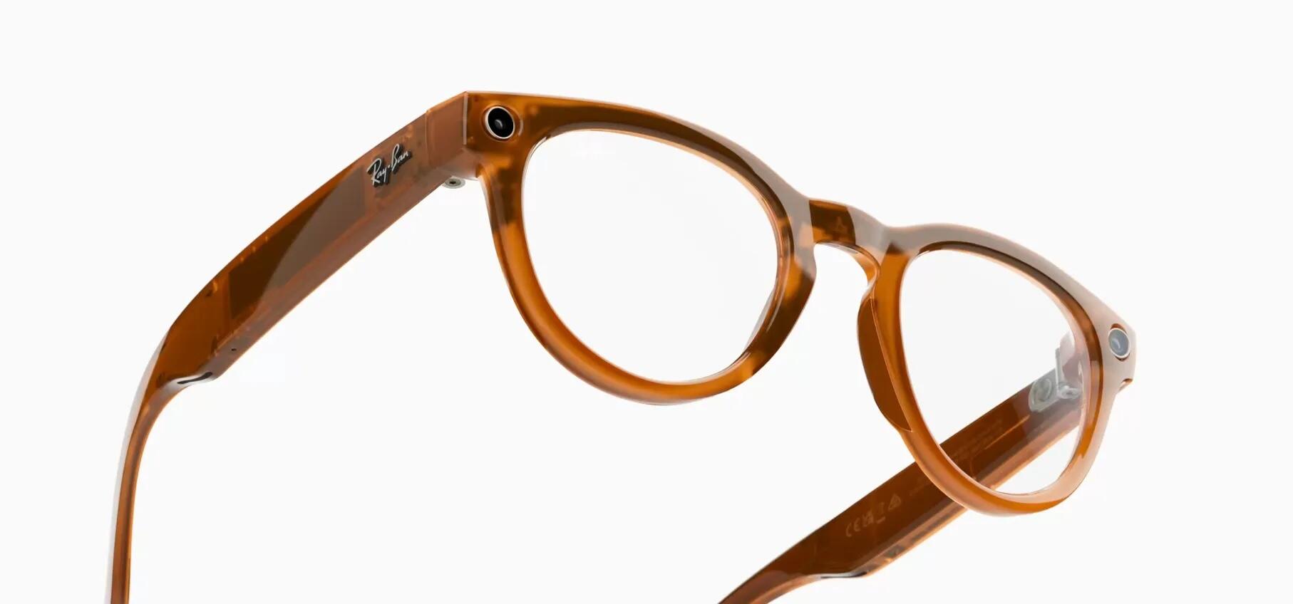 Tortoiseshell glasses with thick frames and small cameras at the corner of each eye.