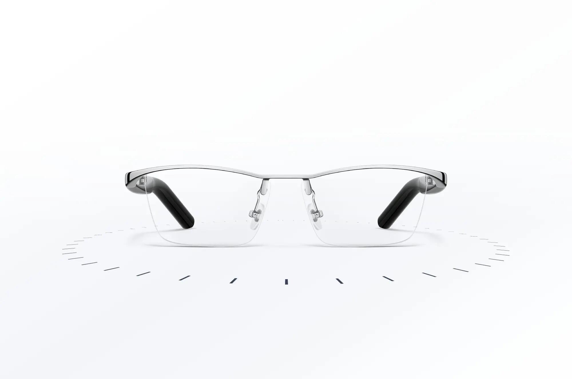 Semi-rimmed glasses with a thick silver frame.