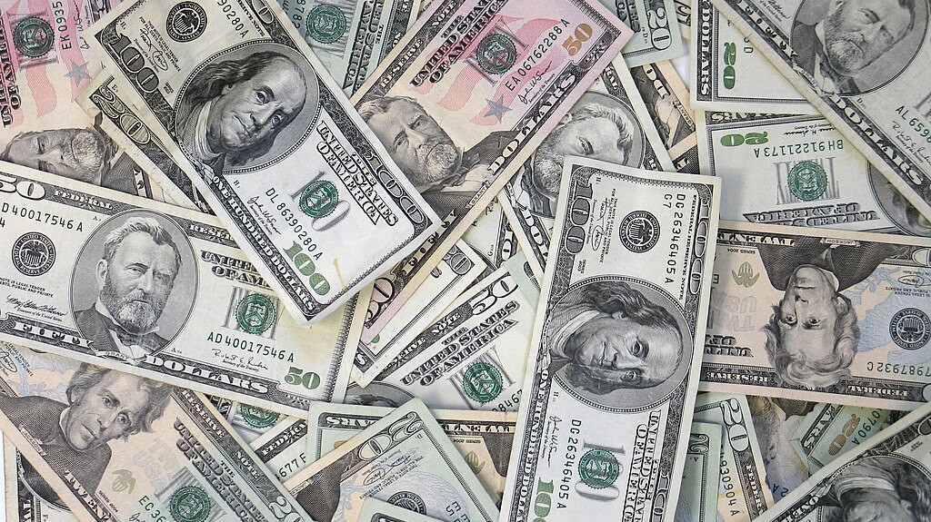 US dollar holds near four-week highs ahead of Fed, ECB decisions