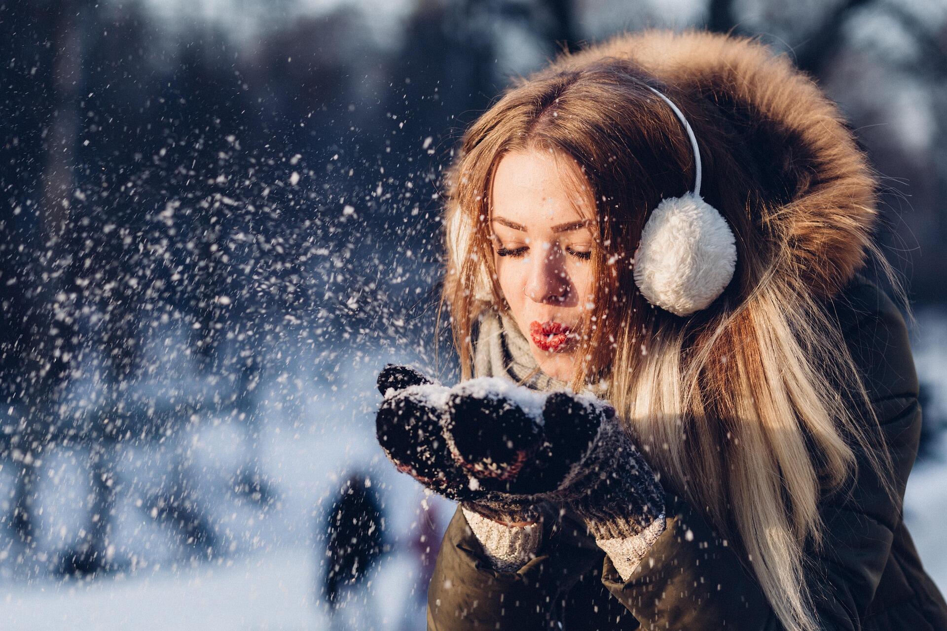 Woman in coat in the snow