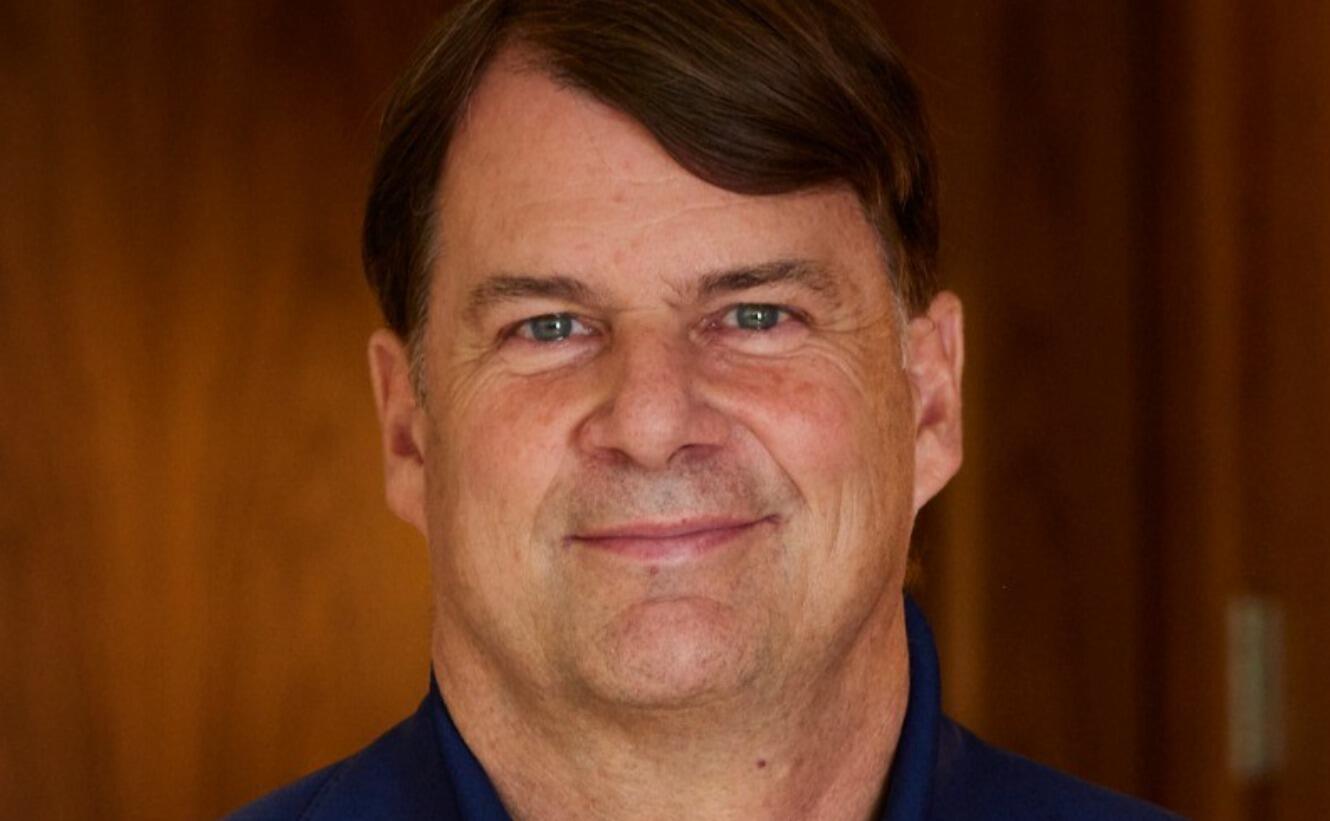 Ford Motors CEO Jim Farley, middle aged, white caucasian man, blue eyes