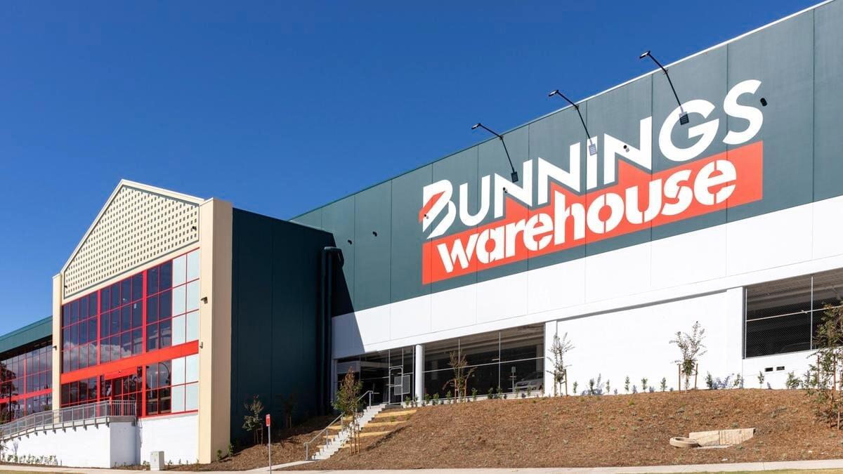 A large green and white building that says "Bunnings Warehouse"